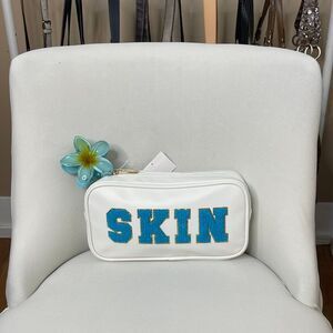 Neutrogena SKIN Terry Logo Travel Makeup Bag